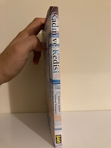 Kadın ve kedisi tek kitap