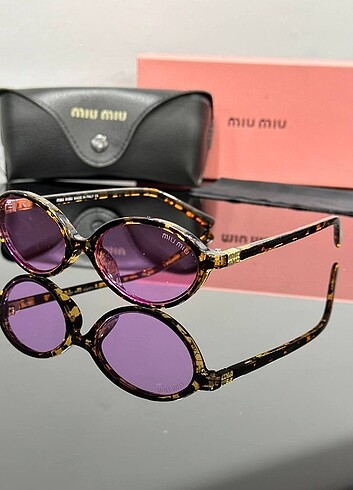 Miu miu gözlük pembe leopar siyah şeffaf 