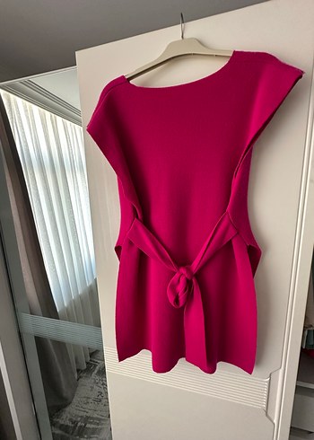 Pembe süveter