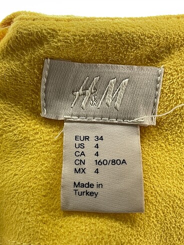 34 Beden sarı Renk H&M Kısa Elbise %70 İndirimli.