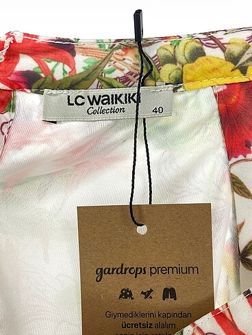 40 Beden çeşitli Renk LC Waikiki Uzun Elbise %70 İndirimli.