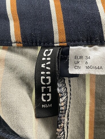 34 Beden çeşitli Renk H&M Kumaş Pantolon %70 İndirimli.