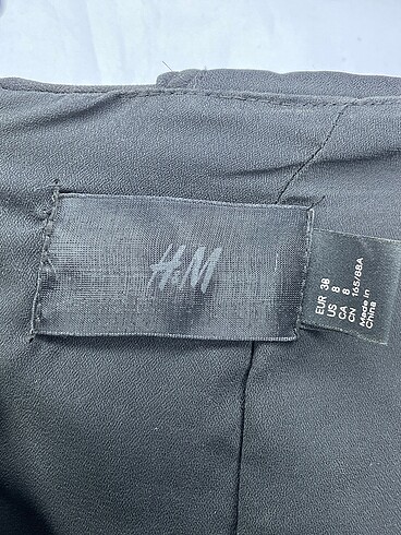 38 Beden siyah Renk H&M Kısa Elbise %70 İndirimli.