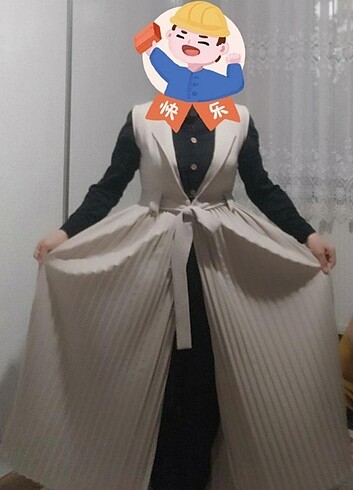 Uzun pileli yelek 
