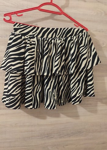 l Beden zebra desenli katlı etek