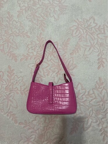 pembe miniso kol çantası