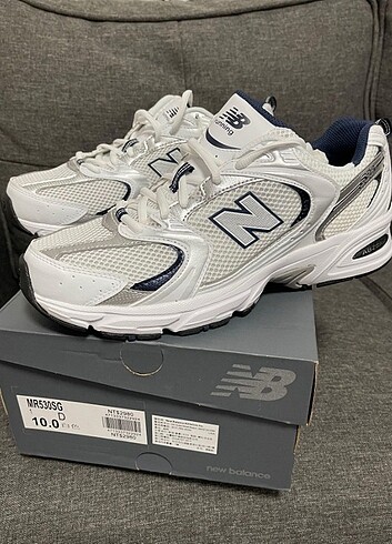 New balance spor ayakkabı ürün magazadan satılıp sıfır kurulu ü