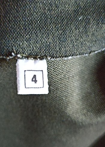 kadın yeşil tunik tişörtüyle birlikte - Görsel 7