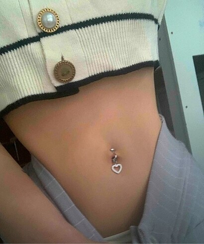 aldım ama hiç kullanmadım sahte göbek piercing
