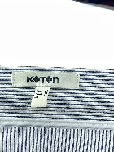 36 Beden çeşitli Renk Koton Midi Etek %70 İndirimli.