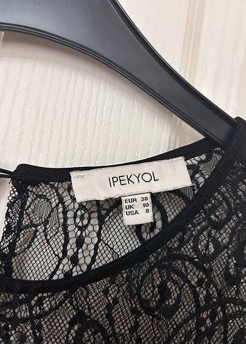 38 Beden İpekyol Siyah Piliseli Elbise