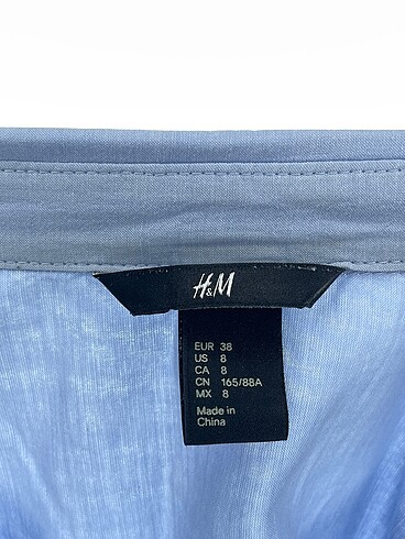 38 Beden mavi Renk H&M Gömlek %70 İndirimli.