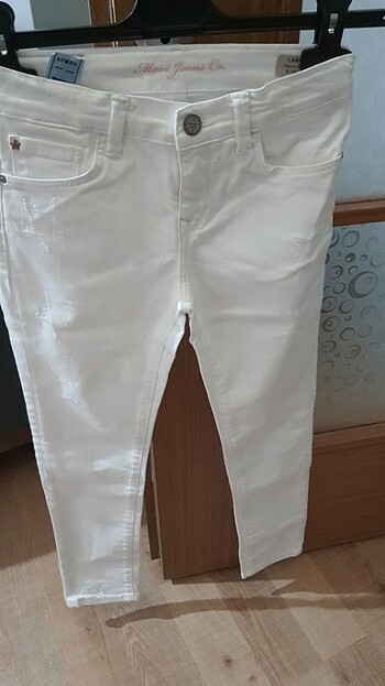 Mavi jeans kiz cocuk beyaz jean 9-10 yaş