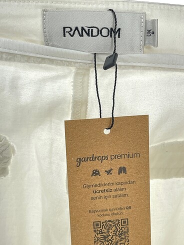 36 Beden beyaz Renk Random Kumaş Pantolon %70 İndirimli.