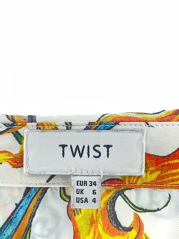34 Beden çeşitli Renk Twist Gömlek %70 İndirimli.