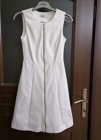 Adl beyaz kumaş yazlık cepli elbise