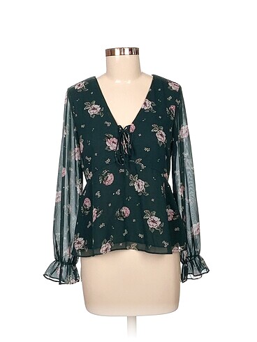 H&M Bluz %70 İndirimli.