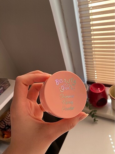 Beauty girl fixing powder