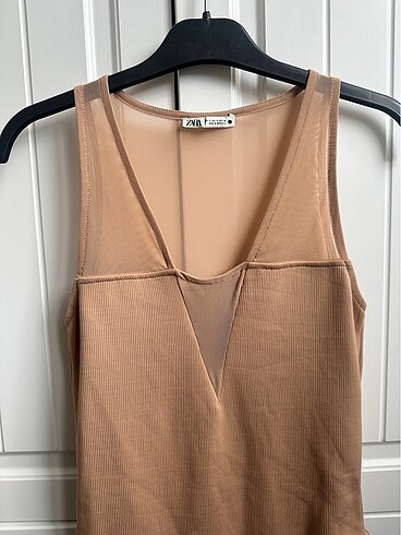 Zara Transparan çıtçıtlı body bluz