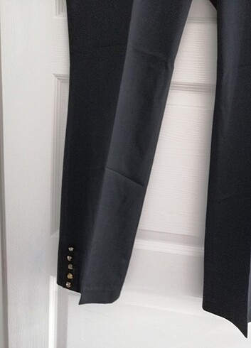 Sellini Selen marka paça düğme detaylı kumaş pantolon 