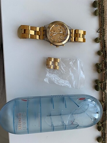 Swatch irony diaphane altin saat