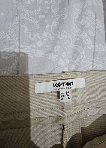 Koton İspanyol paça bej kumaş pantalon