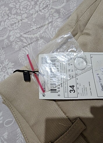 34 Beden İspanyol paça bej kumaş pantalon