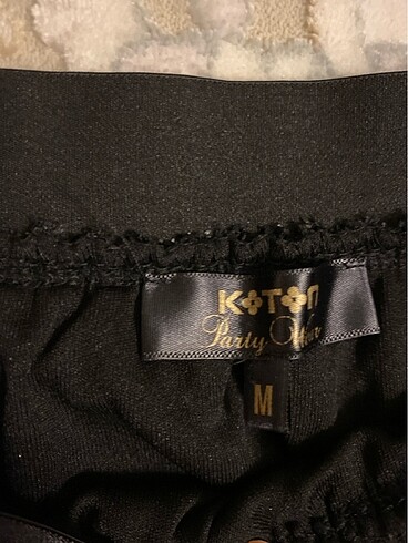 Yanı yırtmaçlı simli etek - Görsel 5