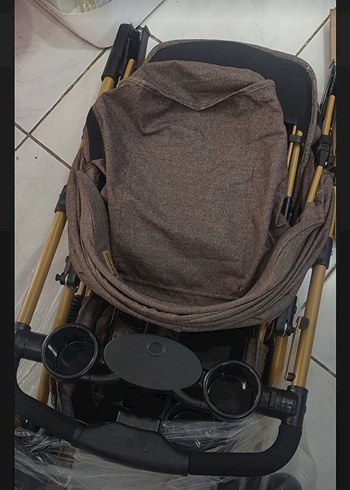9- 36 kg Beden Kahverengi Bebek Arabası Gri Detaylı