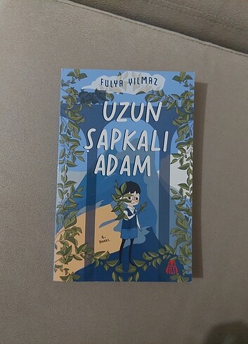 Uzun şapkalı adam 