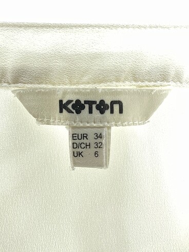34 Beden beyaz Renk Koton Bluz %70 İndirimli.