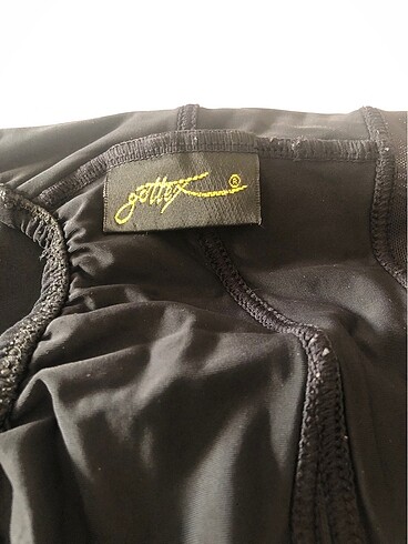 Gottex Silver , siyah önden kruaze ve kemik aksesuarları mayo - Görsel 7