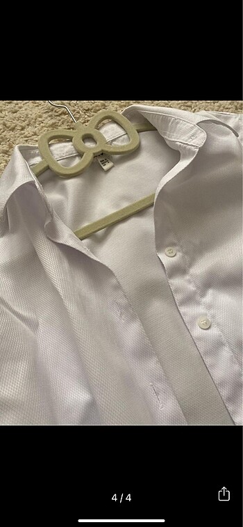 Koton Koton marka parlak görünümlü beyaz gömlek