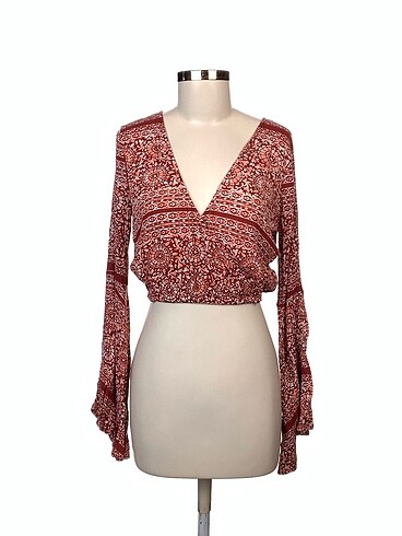 Forever 21 Bluz %70 İndirimli.