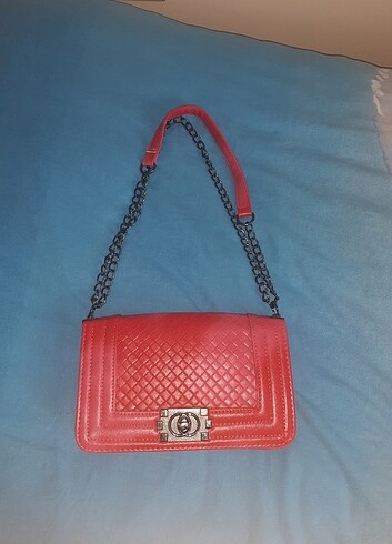 Chanel narçiçeği rengi zincirli çanta