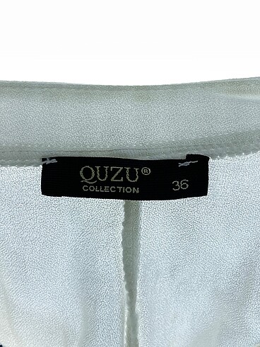 36 Beden beyaz Renk Quzu Bluz %70 İndirimli.