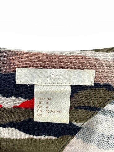 34 Beden çeşitli Renk H&M Kısa Elbise %70 İndirimli.