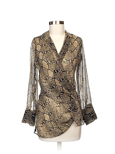 Zara Bluz %70 İndirimli.