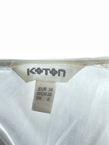 34 Beden beyaz Renk Koton Bluz %70 İndirimli.