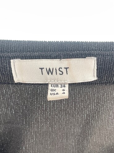 34 Beden siyah Renk Twist Gömlek %70 İndirimli.