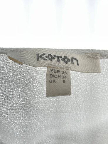 36 Beden beyaz Renk Koton Bluz %70 İndirimli.