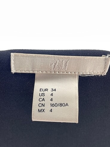 34 Beden siyah Renk H&M Bluz %70 İndirimli.