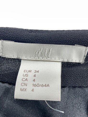 34 Beden siyah Renk H&M Mini Etek %70 İndirimli.