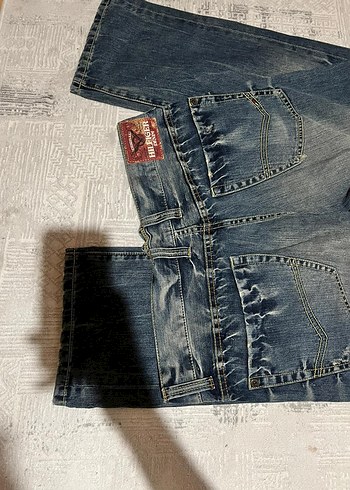 32 Beden Gri Mavi Yırtık Detaylı Erkek Denim Pantolon
