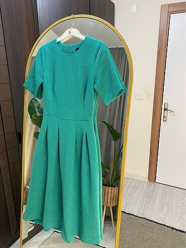 H&M markalı yeşil elbise