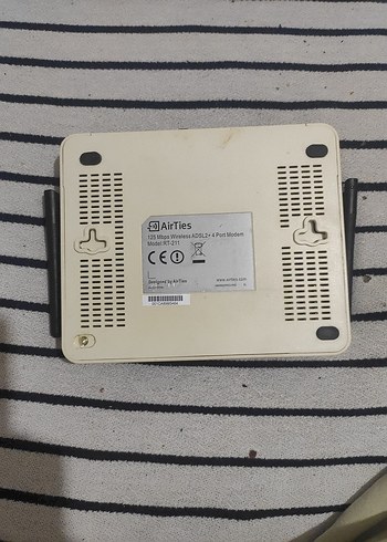 Beyaz modem ve Gri AirTies Mouse Pad - Görsel 6