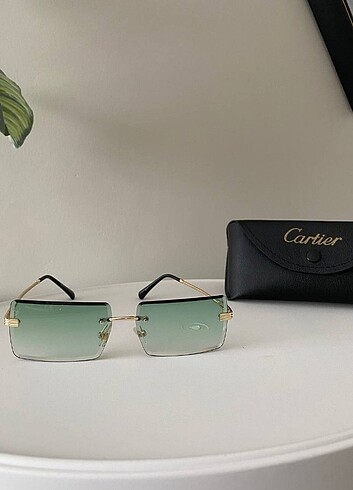 Cartier yeşil gözlük 