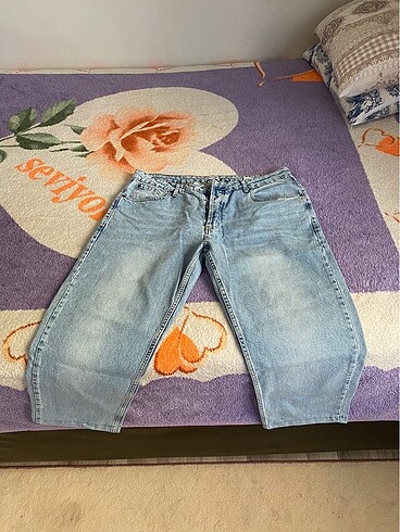 Unisex eskitme jean pantolon.