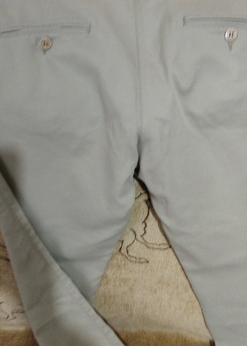 40 Beden Lacoste Düğmeli Bej bayan pantolon