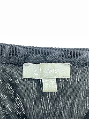 36 Beden siyah Renk Twist Mini Etek %70 İndirimli.